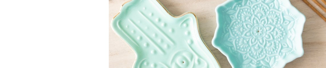 Wholesale incense stick holders and cone burners in traditional and novelty styles. Includes Indian mango wood designs and fun ceramic holders. No minimum order and global shipping.