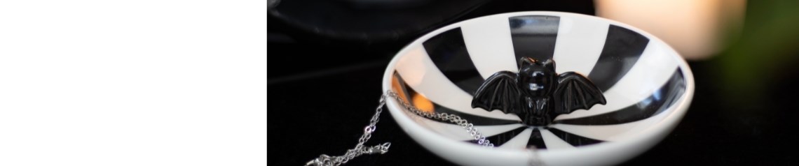 Gothic home decor and quirky gifts inspired by the strange and supernatural. Designed for lovers of the weird and wonderful. Ideal for alternative lifestyle and spooky-themed shops. Ships worldwide with no minimum order.