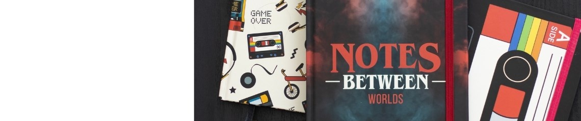 Between Worlds is a nostalgic gift and homeware collection for tabletop gamers, retro lovers and pop-culture fans. It features dice-themed accessories, cassette-style stationery and cult-inspired decor that blend fantasy worlds with 80s throwbacks. This range is perfect for retailers looking to explore new dimensions of gifting.