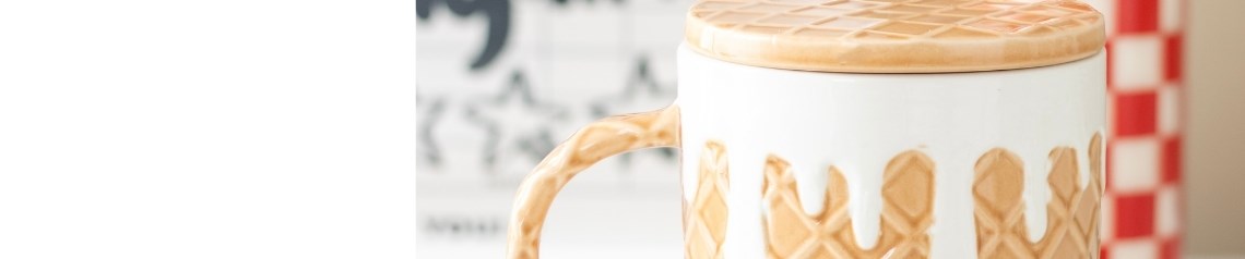 Slice of Comfort wholesale gift range inspired by comfort foods, including pizza slice jewellery, enamel keyrings, caramel waffle mugs, pancake oil burners, and scented candles in pizza and waffle fragrances. Fun, food-themed gifts ideal for novelty retailers, lifestyle stores, and impulse gift displays.