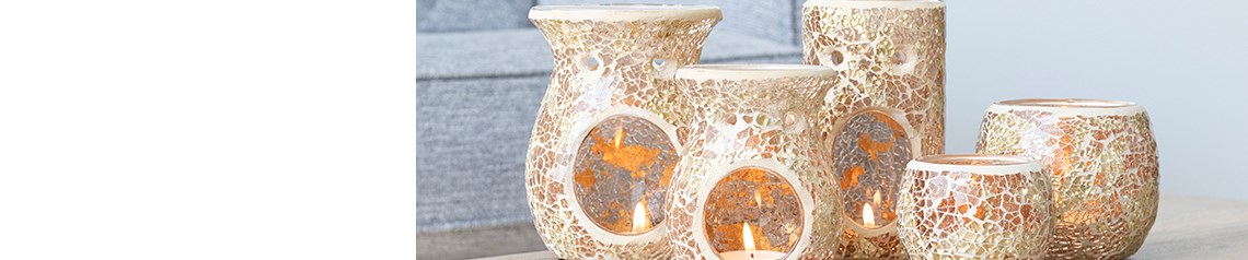 Wholesale crackle glass oil burners and candle holders in red, black, silver and gold. Home fragrance products with a shimmering finish, perfect for ambient lighting and home styling. No minimum order, ships worldwide.