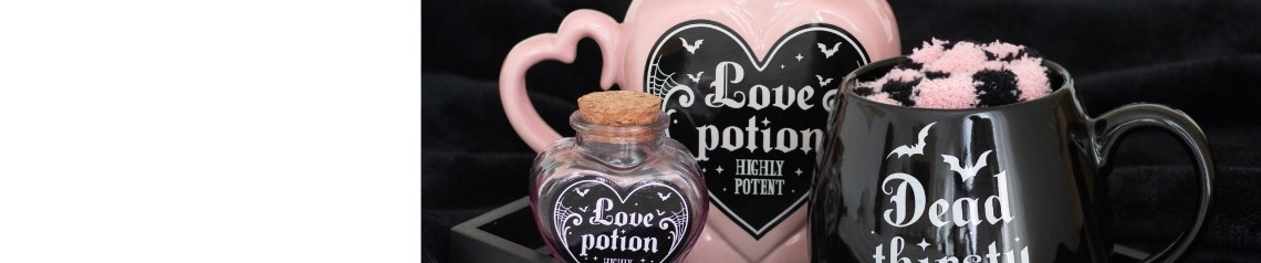 A kawaii-inspired coffin-core collection of pink and black gifts and decor featuring bats, spiderwebs and heart-shaped potions. Designed for pastel goths and creepy-cute Halloween displays, with playful phrases and coffin-shaped accessories.