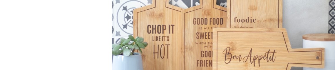 Eco-friendly bamboo serving boards with engraved messages. Ideal for kitchen gifts and dining decor. Durable, sustainable, and ready for resale with no minimum order.