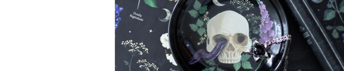 Gothic homeware and gift range featuring snake motifs, poisonous plants and vintage-style curios, perfect for alternative shops and customers who enjoy dark botanical themes