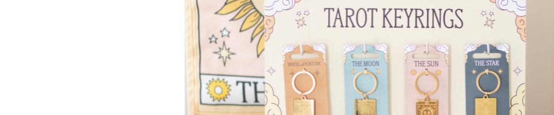 Vintage Tarot wholesale gift collection featuring classic tarot card illustrations on notebooks, keyrings, trinket dishes, wall art, scented candles, jewellery, and velvet drawstring bags. Designed with rich colours and mystical motifs like The Sun, The Moon, and The Star, ideal for spiritual retailers, gift shops, and lifestyle stores seeking esoteric and boho-inspired stock.