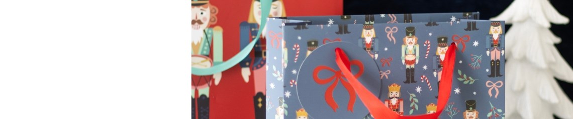 Wholesale Christmas gift bags in a variety of unique designs. Ideal for gift shops, retail displays and easy festive wrapping.