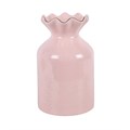 Vaso da fiori rosa a coste