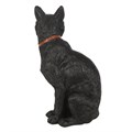 Estatueta de um gato preto sentado