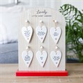 Set of 24 Heart Ceramic Mini Signs on Display