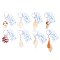 Set of 36 Resin Seashell Keyrings in Display