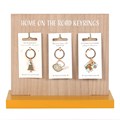 Set of 24 Home on the Road Camping Keyrings on Display