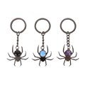 Set of 18 Crystal Spider Keyrings on Display