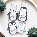 Set of 24 Hanging Penguin Signs on Display