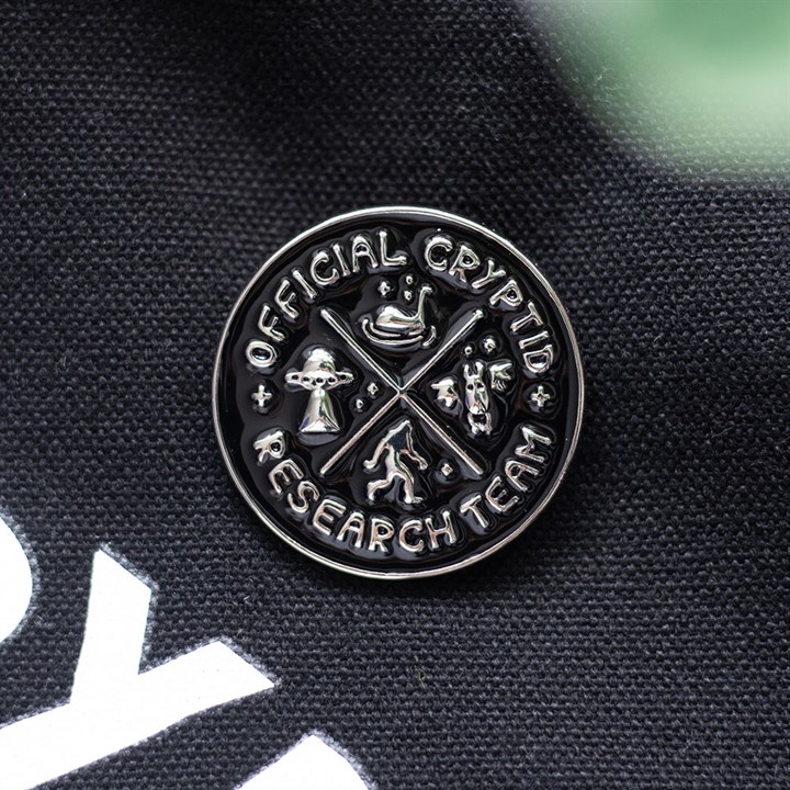 Badge en émail de l'équipe de recherche sur les cryptides