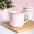 Tasse mit rosa Blumenmuster und Chrysanthemen