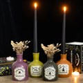 4er-Set mit Vasen und Kerzenhaltern im Fläschchen-Design