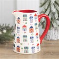 Keramische bloemenkan met kerstmotief